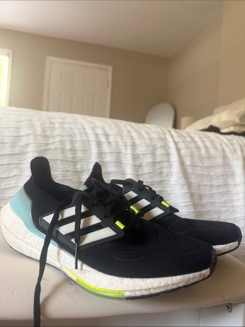 Adidas Black UltraBoost Sneakers with White Stripes and Mint Heel